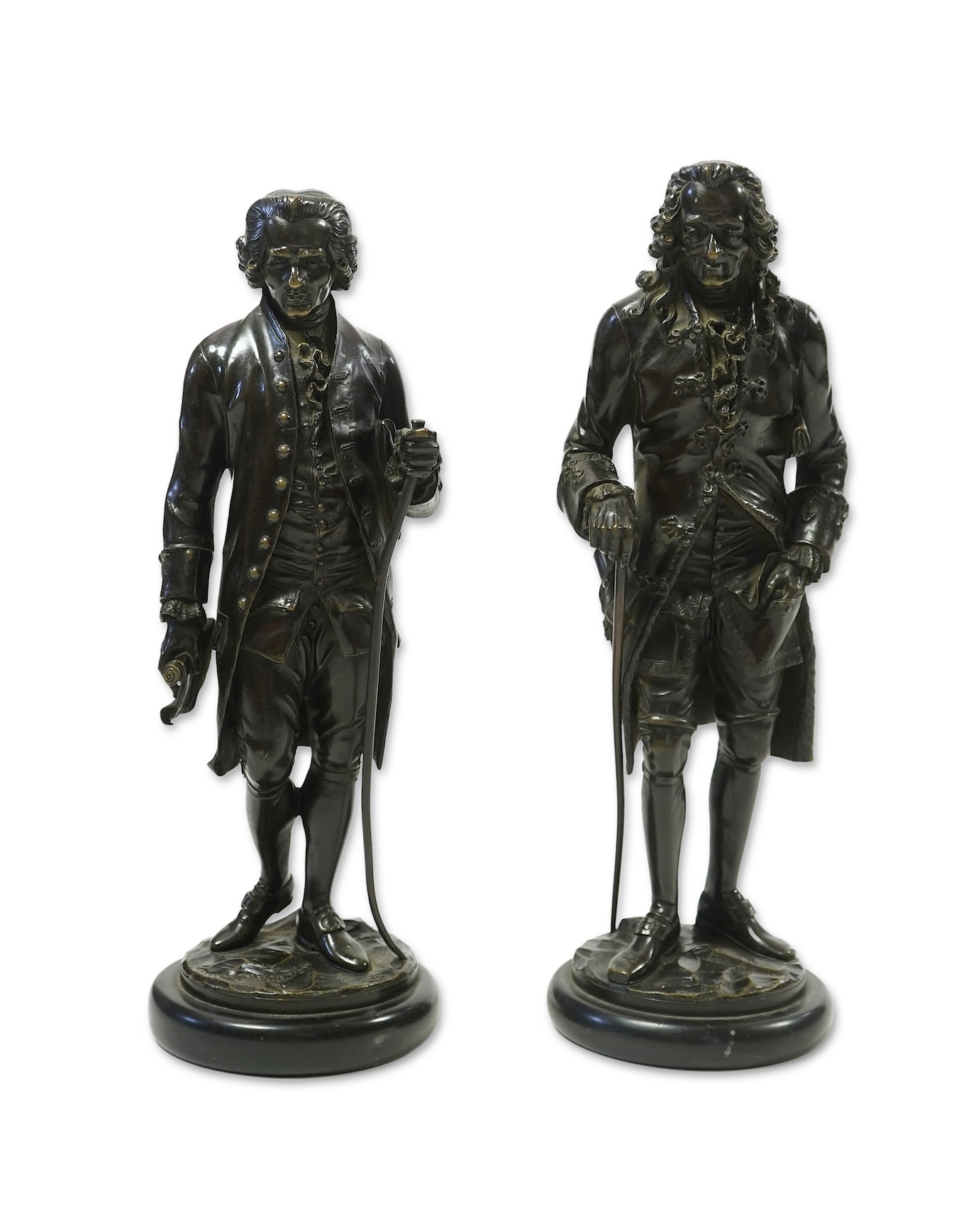 After Jean-Claude-Joseph Rosset (1706-1786), two patinated bronze figures of Voltaire and Jean-Jacques Rousseau, 19th century